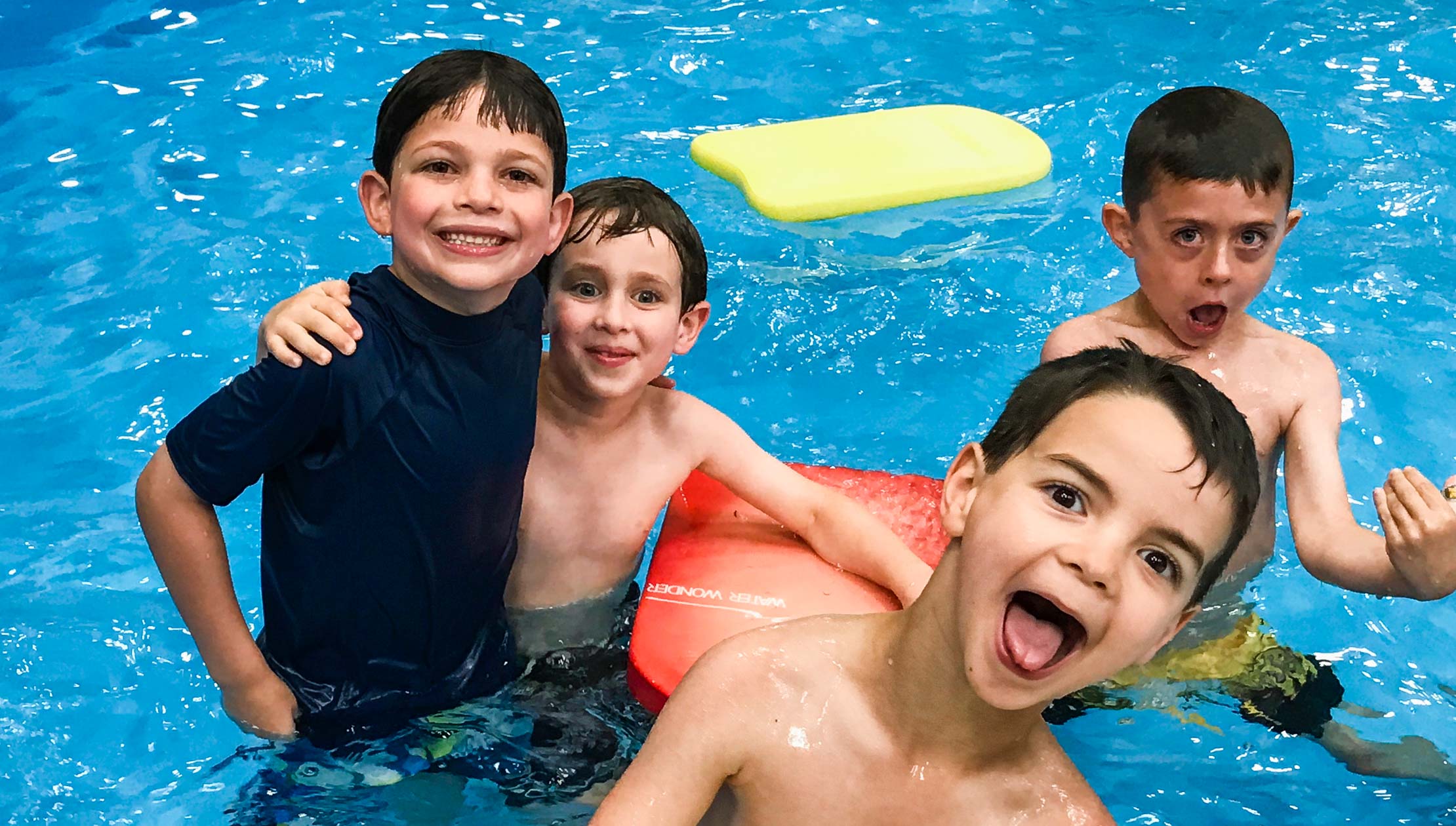 Boys swimming in the pool