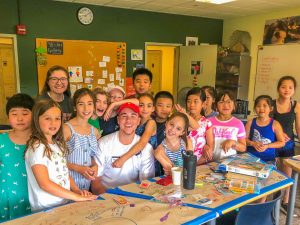 kids in classroom smiling